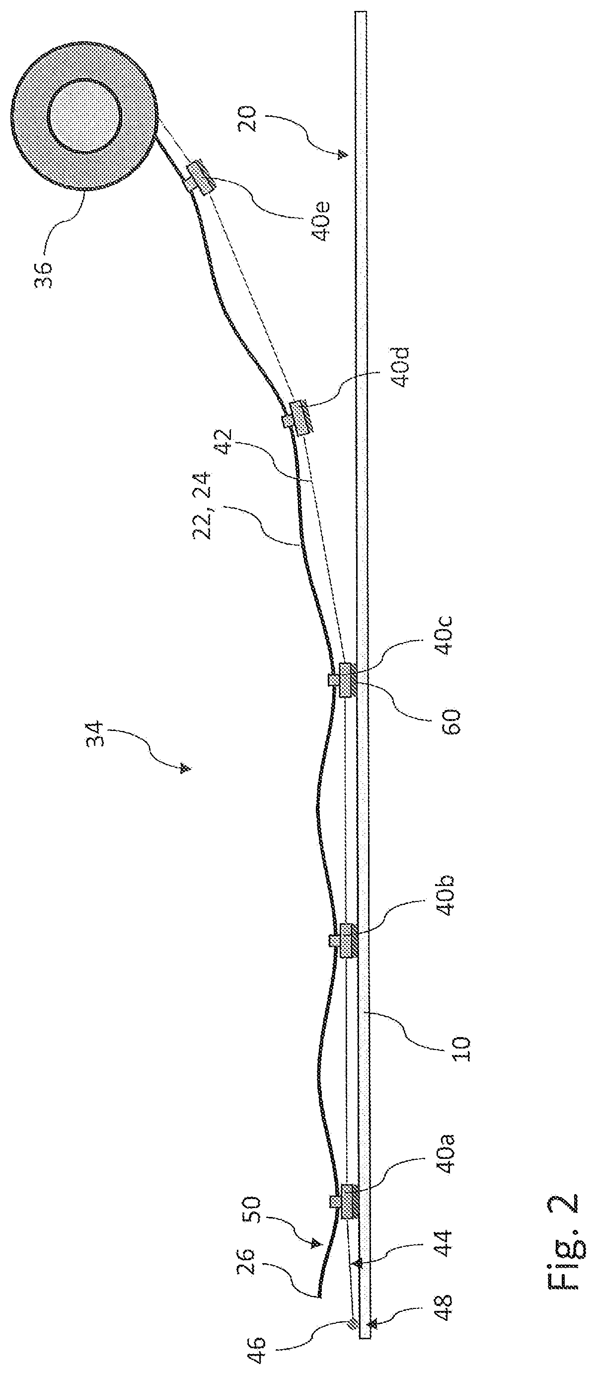 Method of securing cables to a wind turbine blade