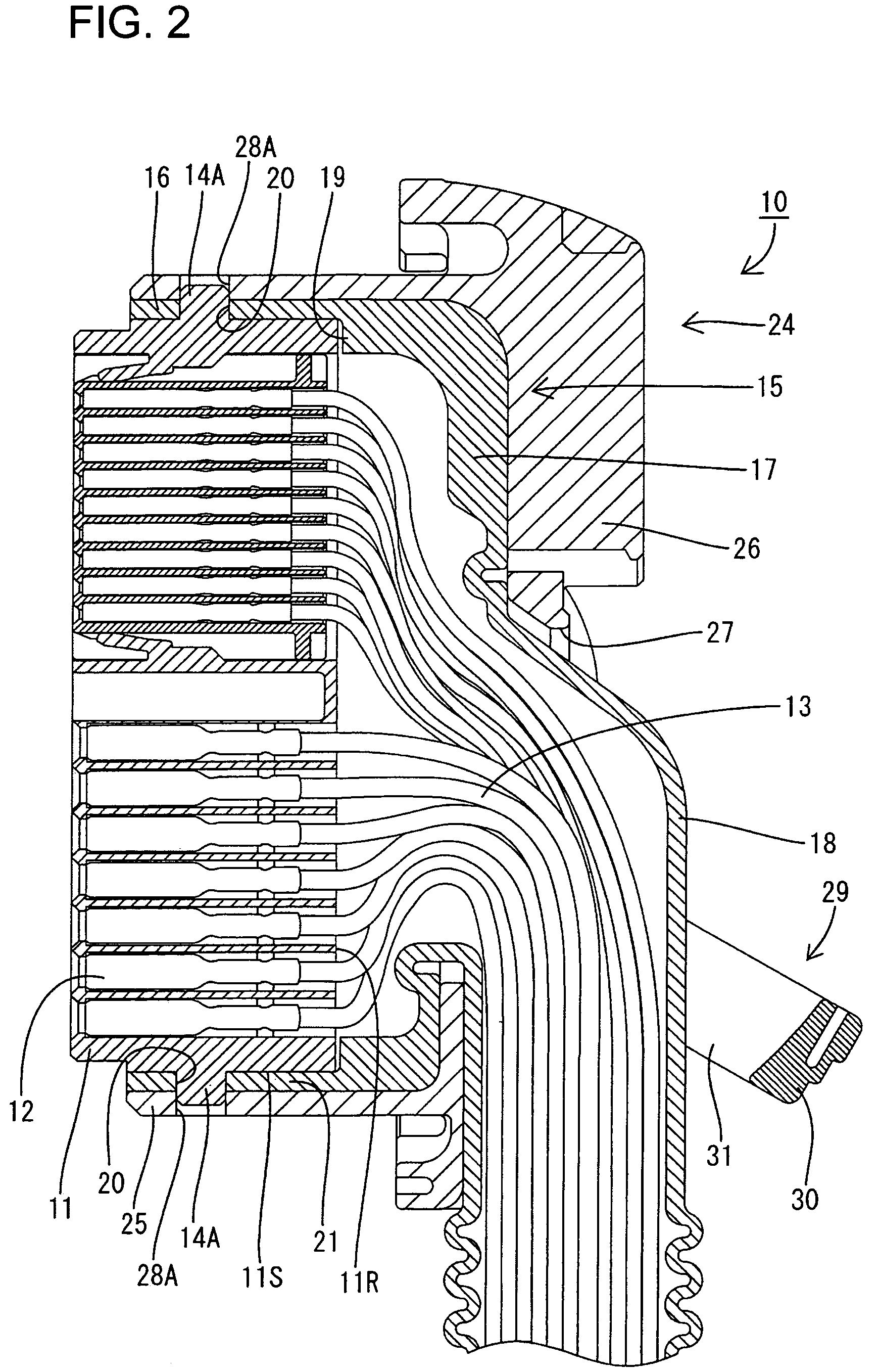 Connector with a sealing boot having inner and outer sealing lips