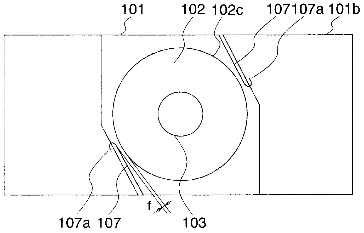 Air cleaner having vanes with a winglike cross-section between a shroud and baseplate for rotation within a housing