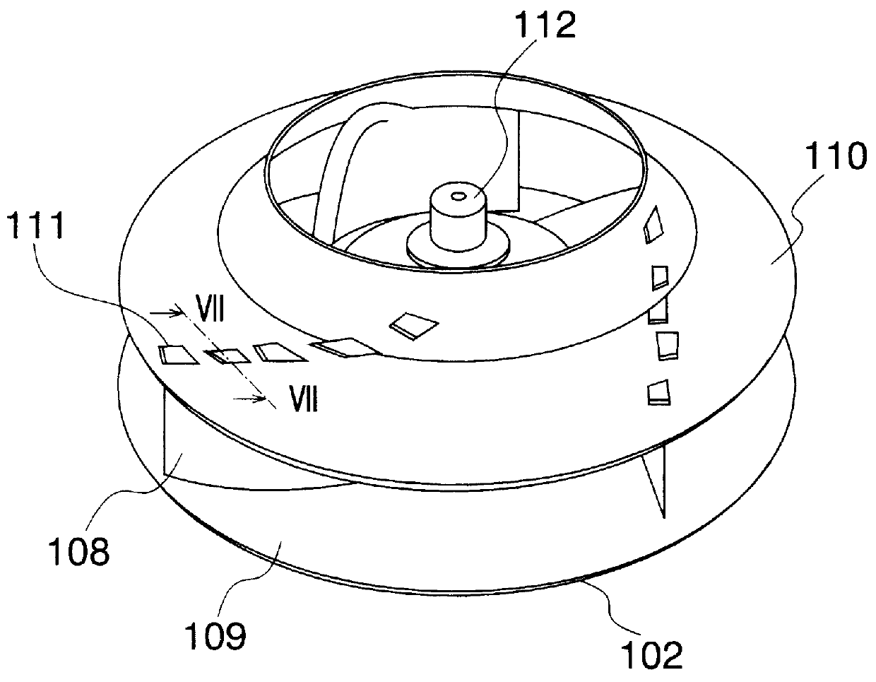 Air cleaner having vanes with a winglike cross-section between a shroud and baseplate for rotation within a housing