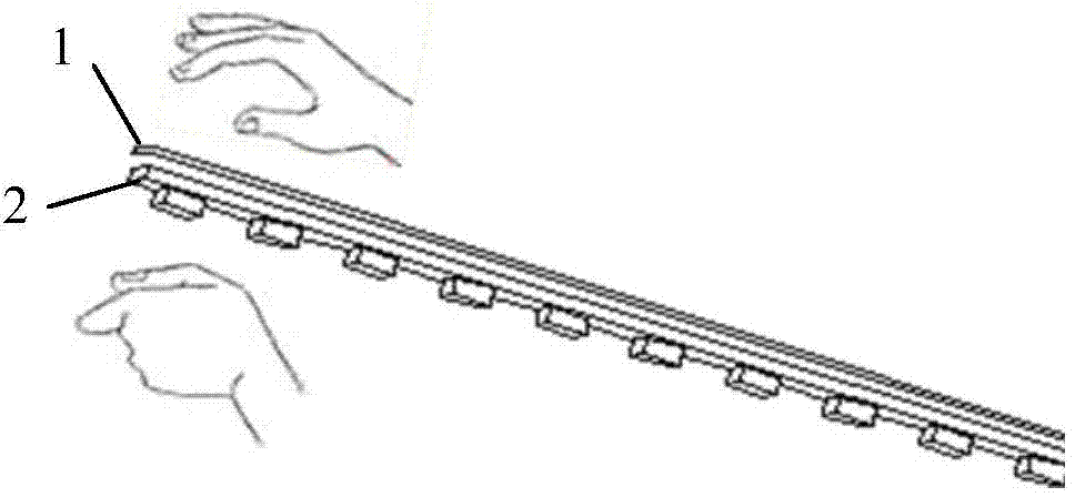 Adhesive tape attaching device