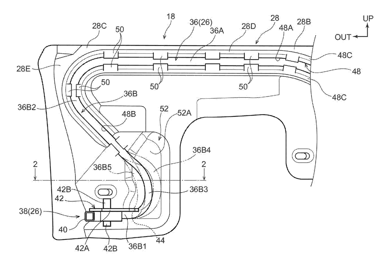 Vehicle front portion structure provided with a pedestrian collision detection sensor