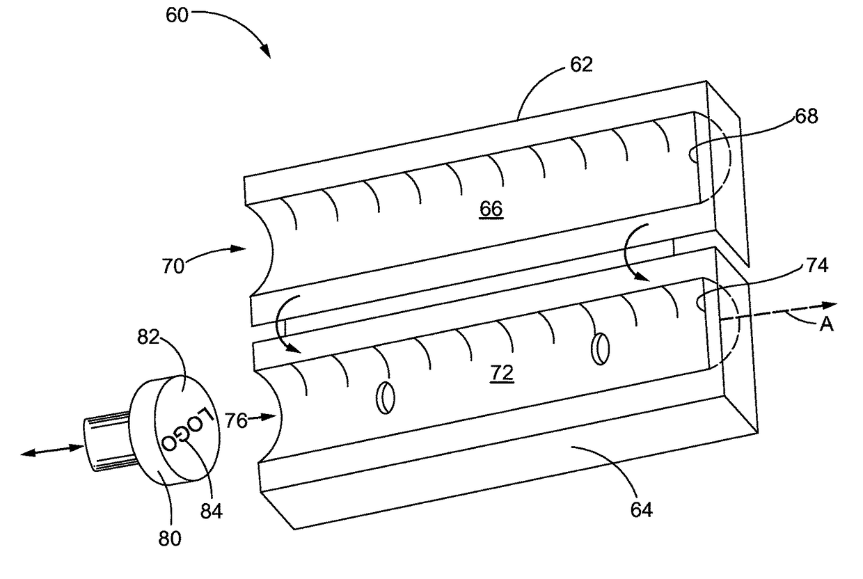 Apparatus and method for forming a design on an expanded bead foam article