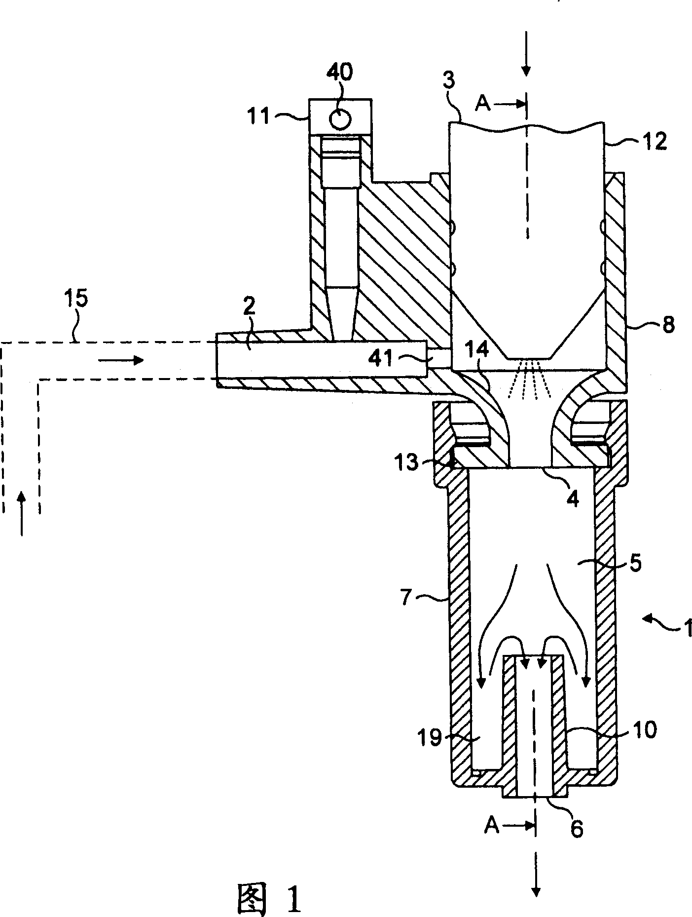 Replaceable nozzle for producing a frothed liquid