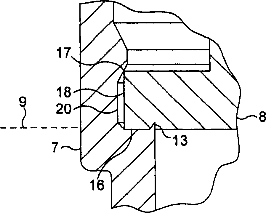 Replaceable nozzle for producing a frothed liquid