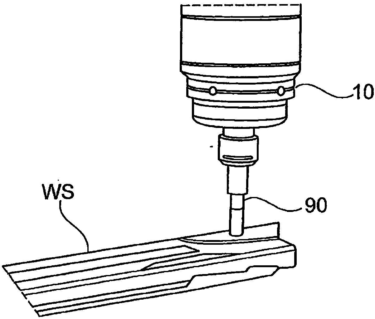 Method for processing a workpiece made of hard metal for producing a tool main body