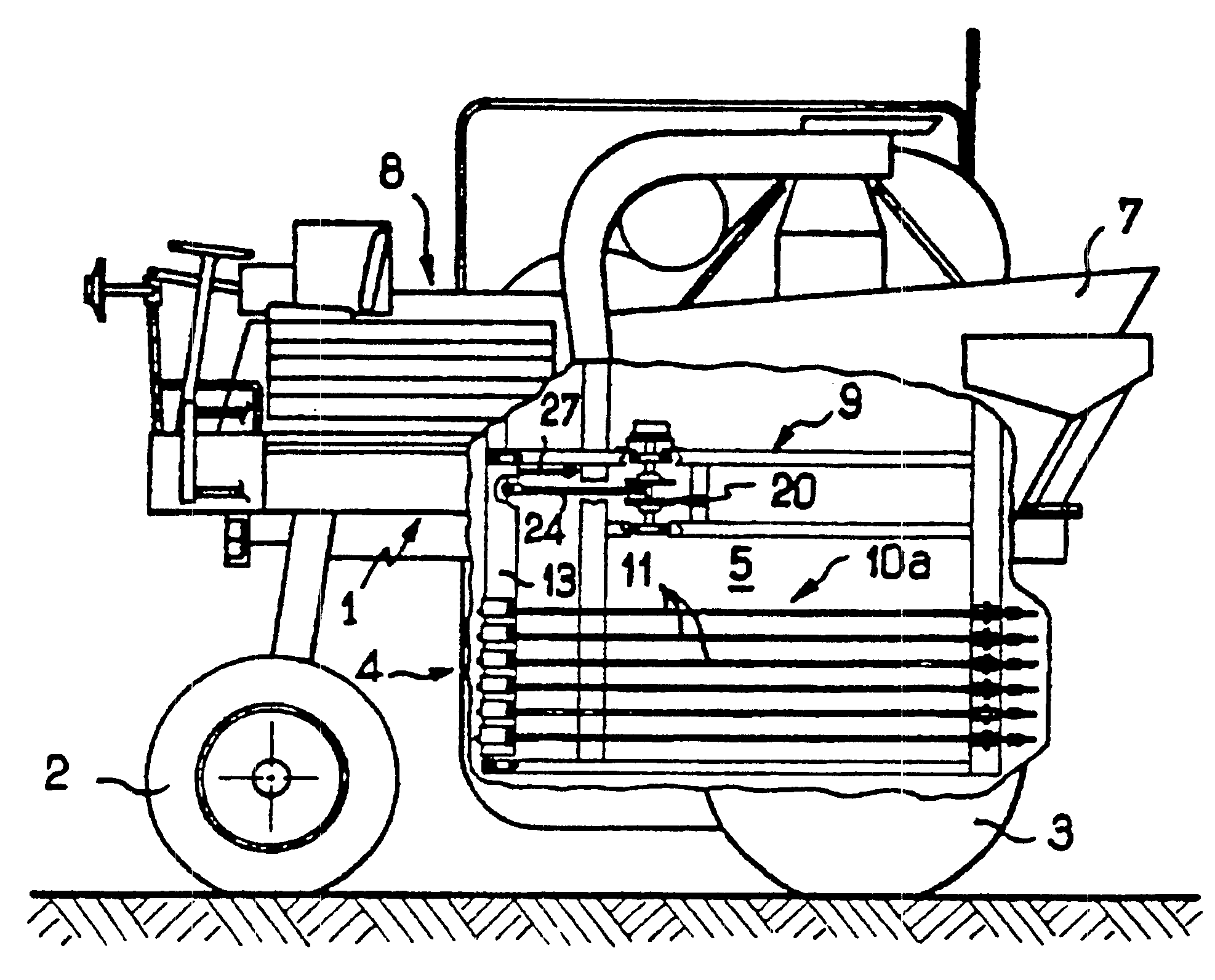 Machine for harvesting fruit and berries and the like from fruit trees and bushes planted in a row, and shaker rod for a machine of this kind