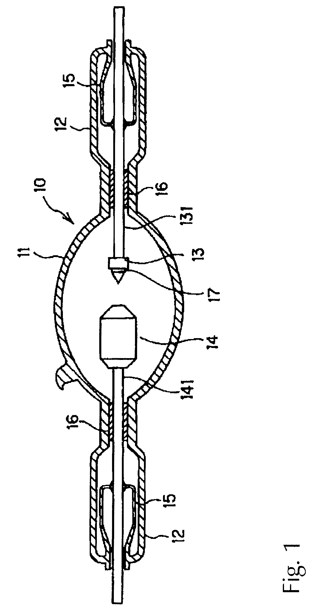 Discharge lamp having a cathode and emitter assembly composed of tungsten and thorium oxide and joined through a carbide interface region