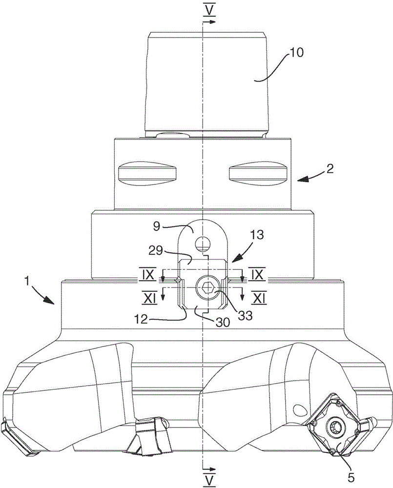 Fixation arrangement as well as an interchangeable part and a lock key