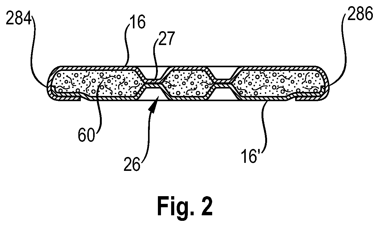 Absorbent cores having material free areas