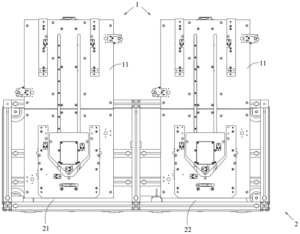 Material taking and placing device for automatic stereoscopic warehouse