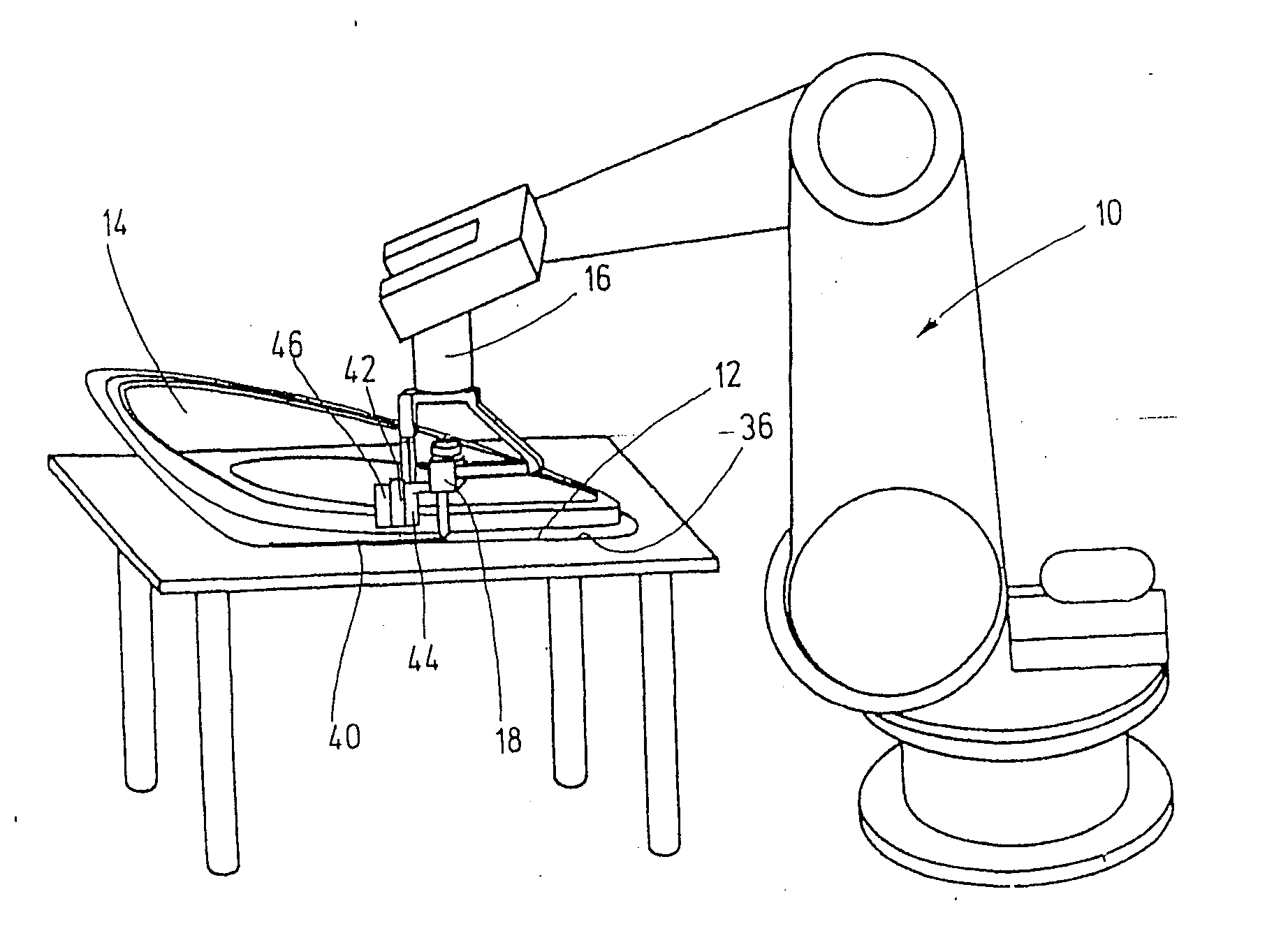 Device for applying adhesive to a workpiece