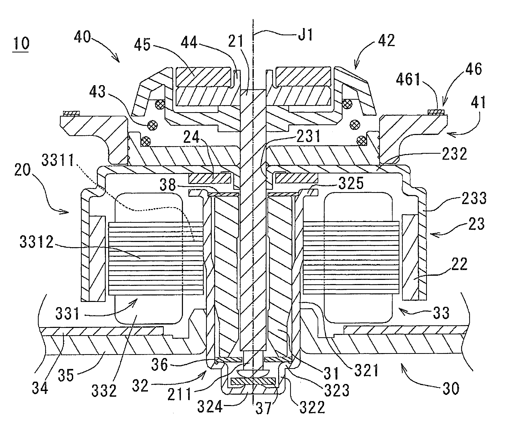 Motor having chucking device and disk driving apparatus including same