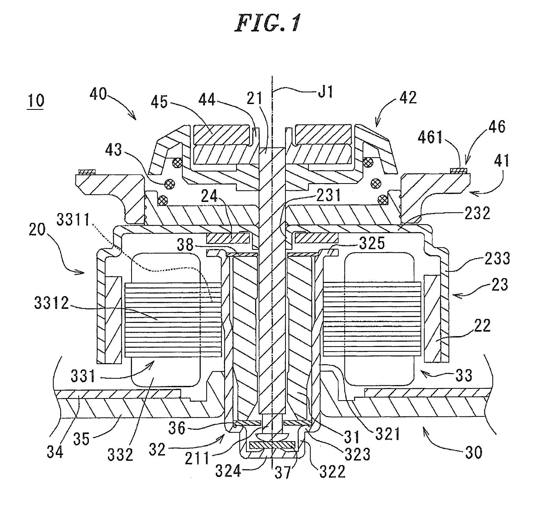 Motor having chucking device and disk driving apparatus including same