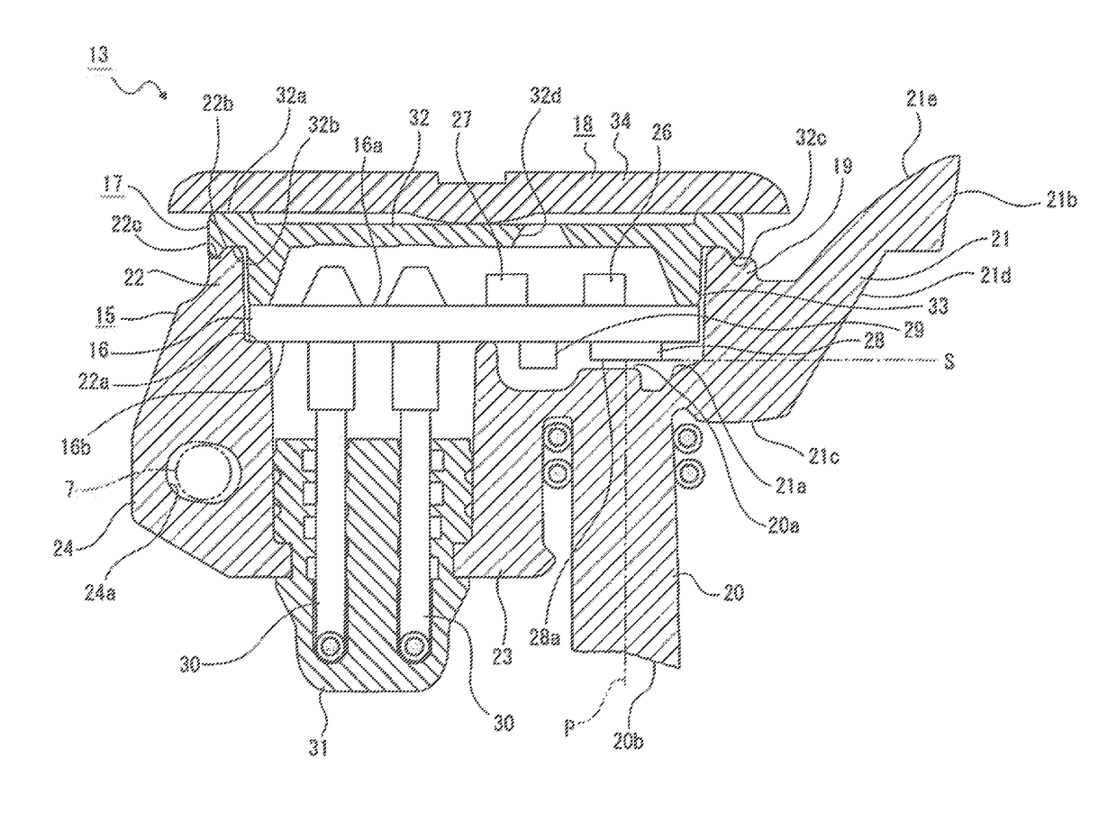 Vehicle lamp with integrally formed housing, first light guiding lens, and second light guiding lens