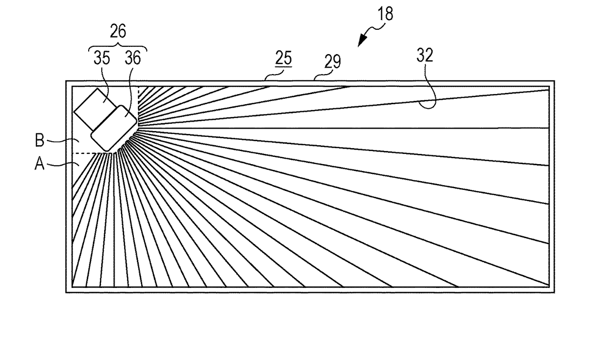 Liquid ejecting apparatus with ink receiving tray and detector