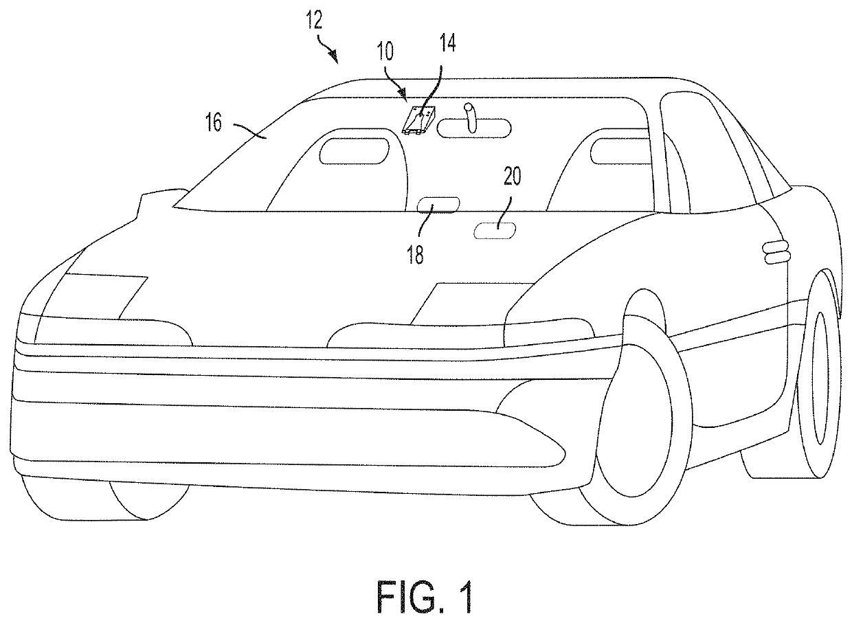 Vehicular vision system with glare reducing windshield