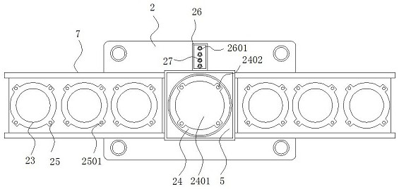 Wave spring assembling device with limiting structure