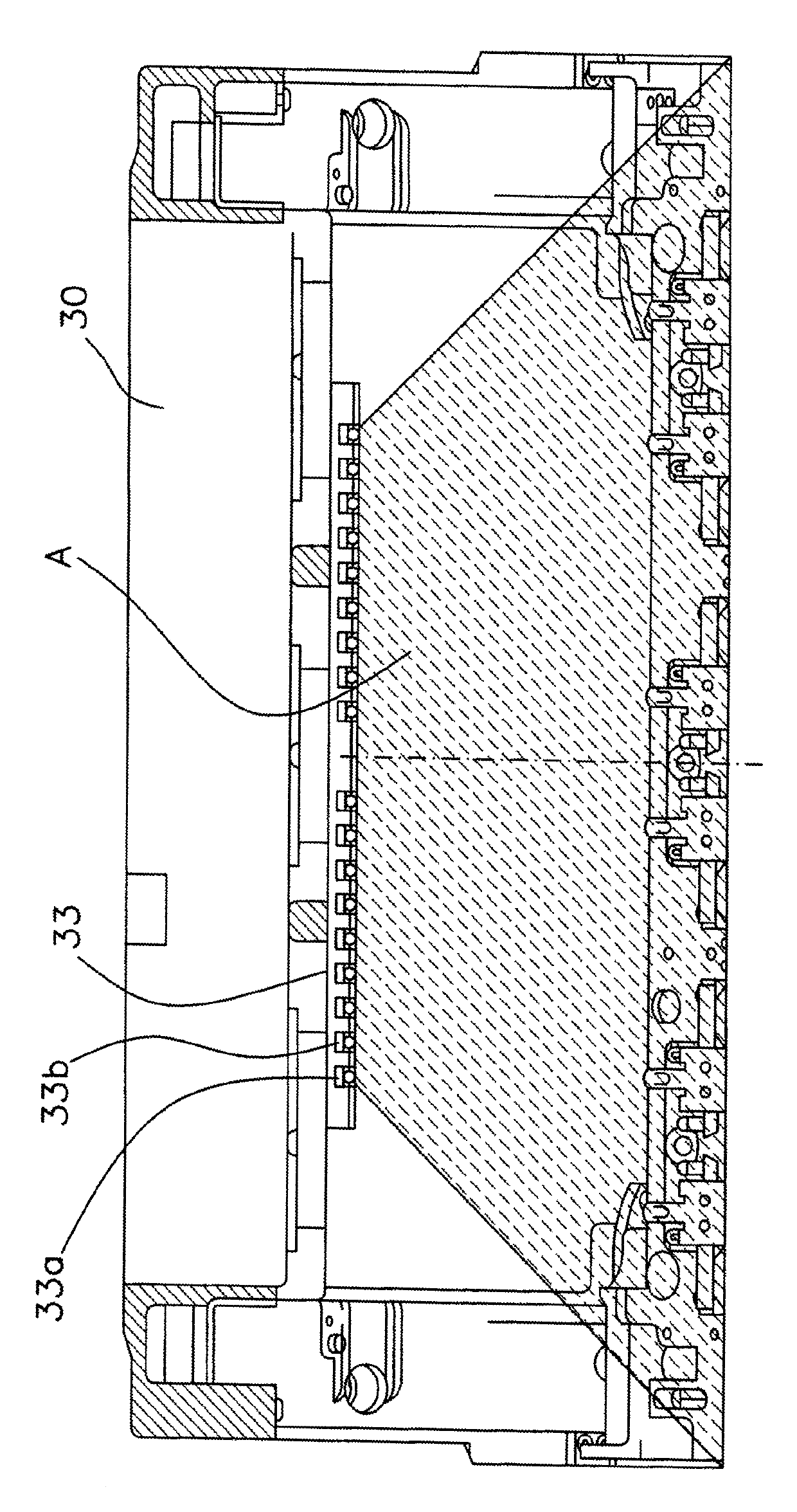 Flat knitting machine with lighting device