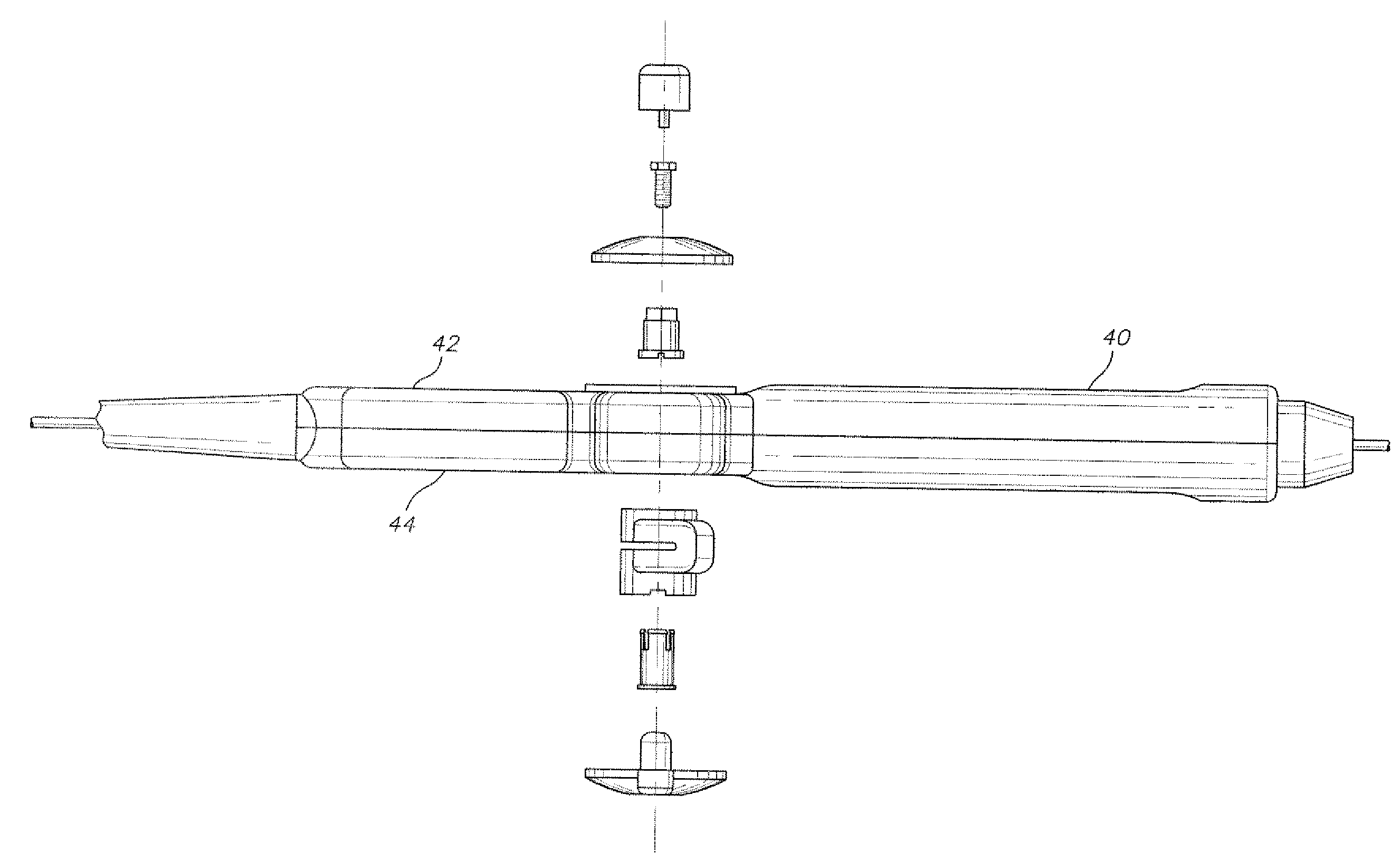 Insert molded catheter puller member connectors and method of making