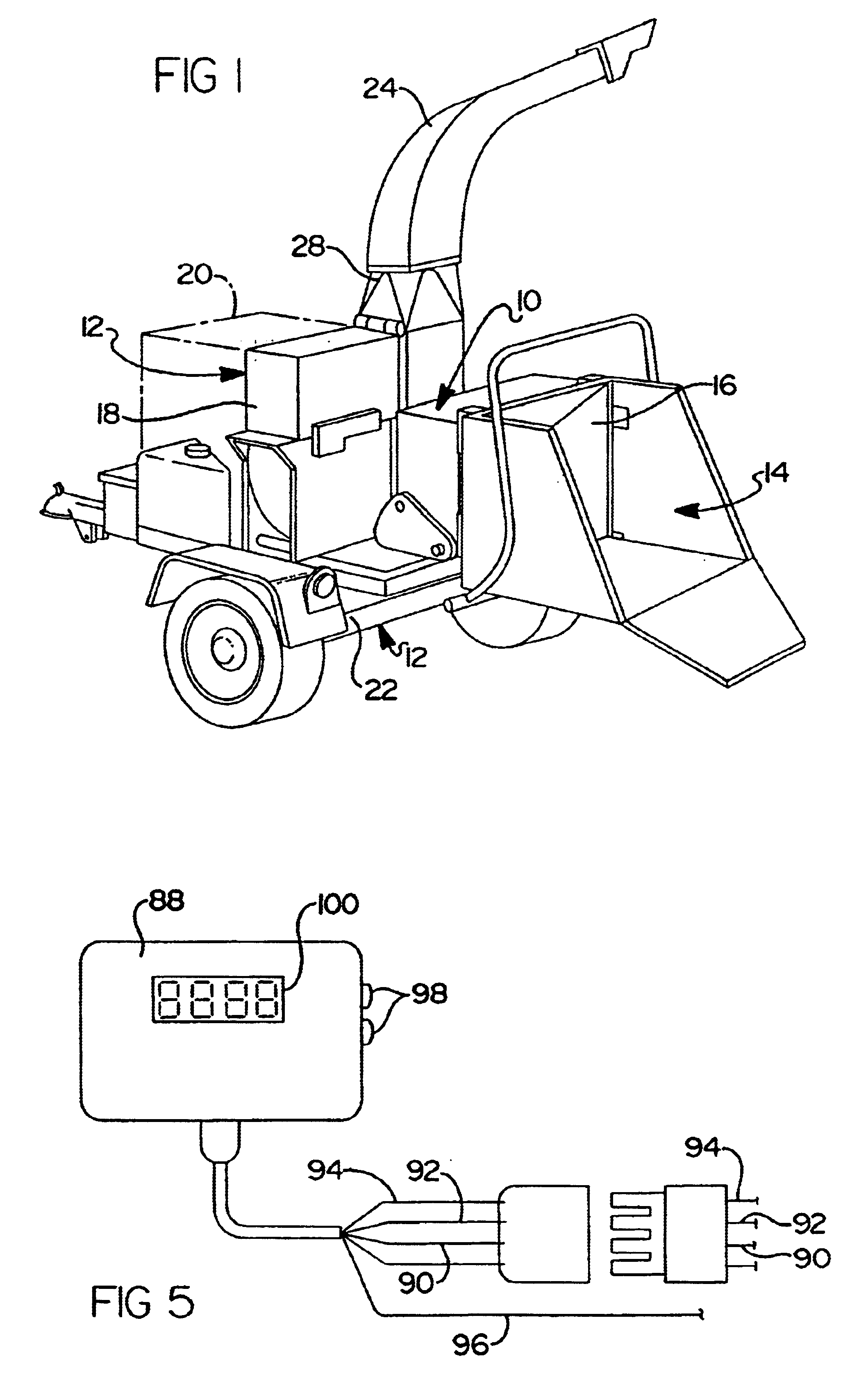 Reversing automatic feed wheel assembly for wood chipper