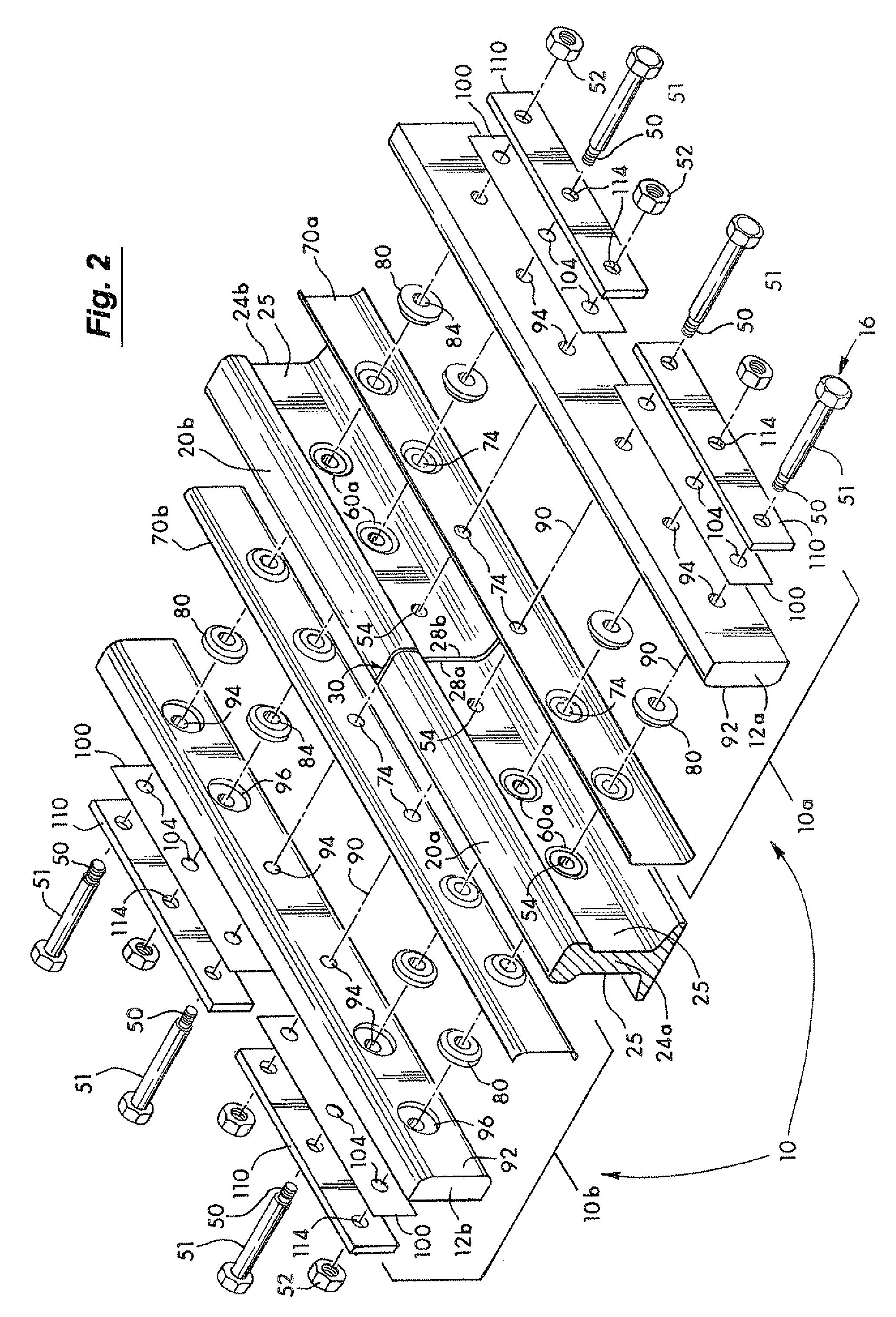 Rail joint assembly using embedded load transfer keys and method therefor