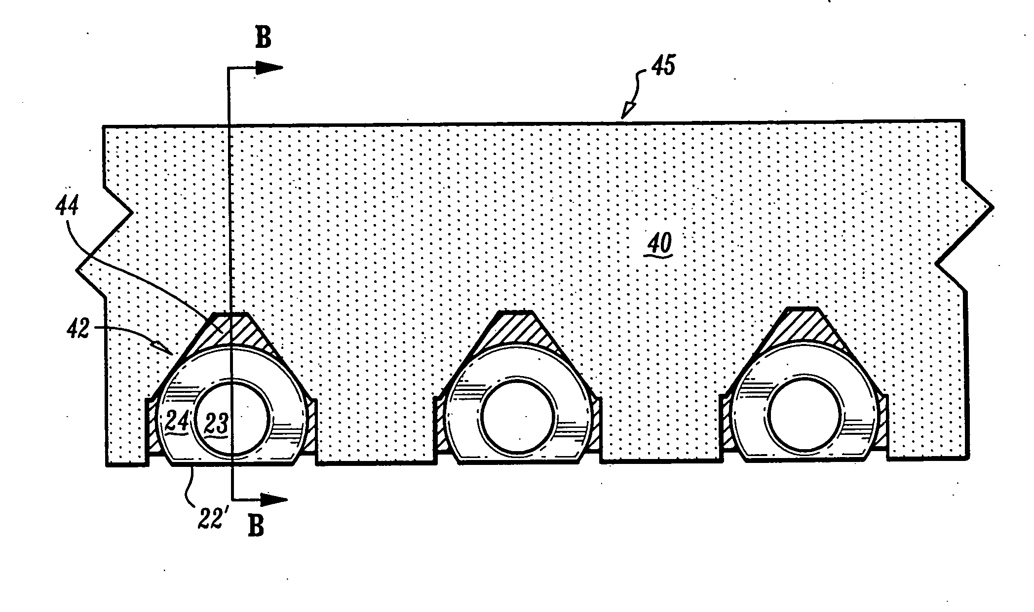 Devices and methods for side-coupling optical fibers to optoelectronic components