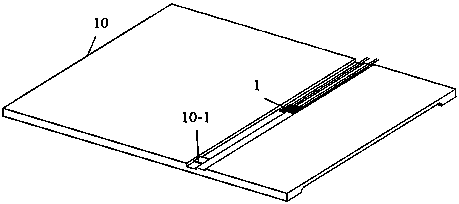 A scraper conveyor load monitoring device and chain tension estimation method