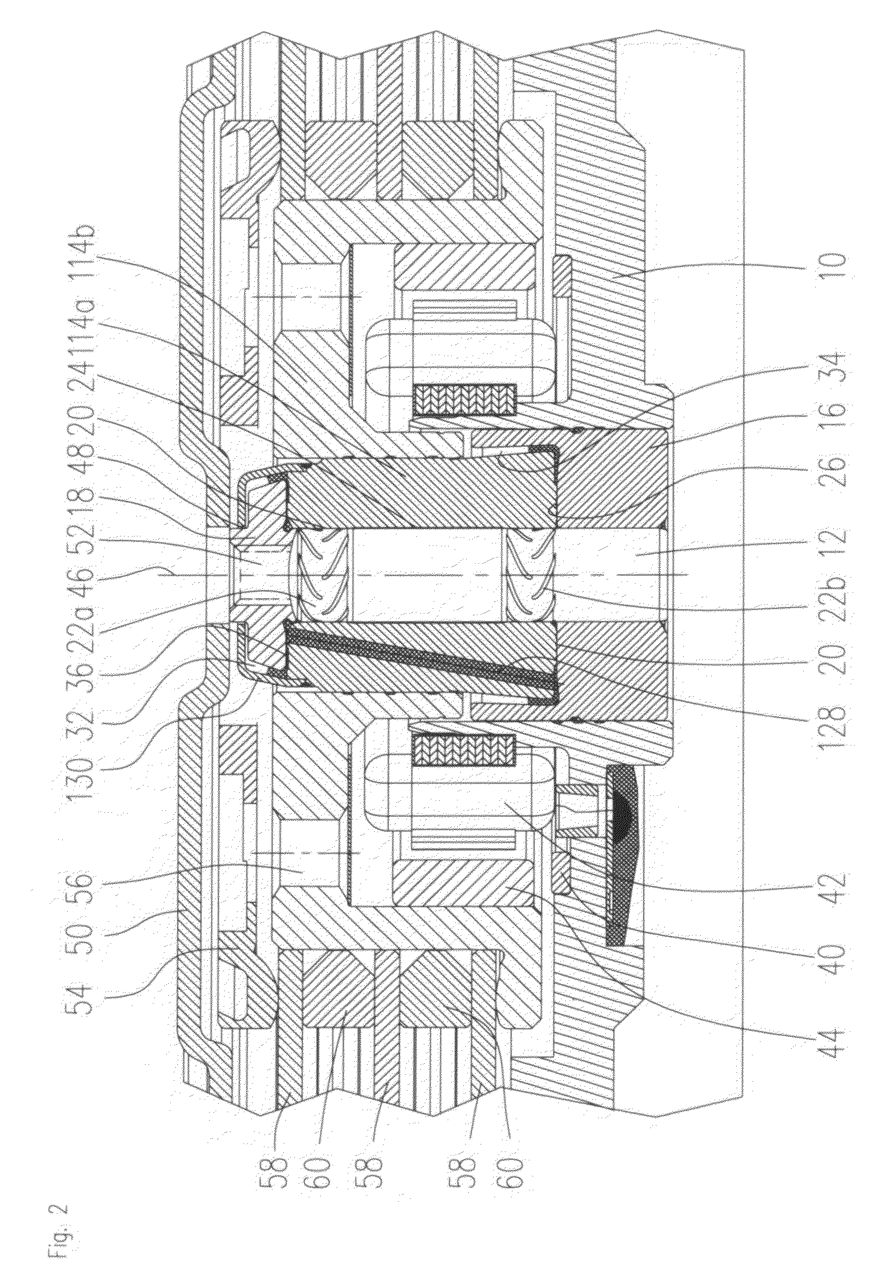 Spindle motor having a fluid dynamic bearing system and a stationary shaft