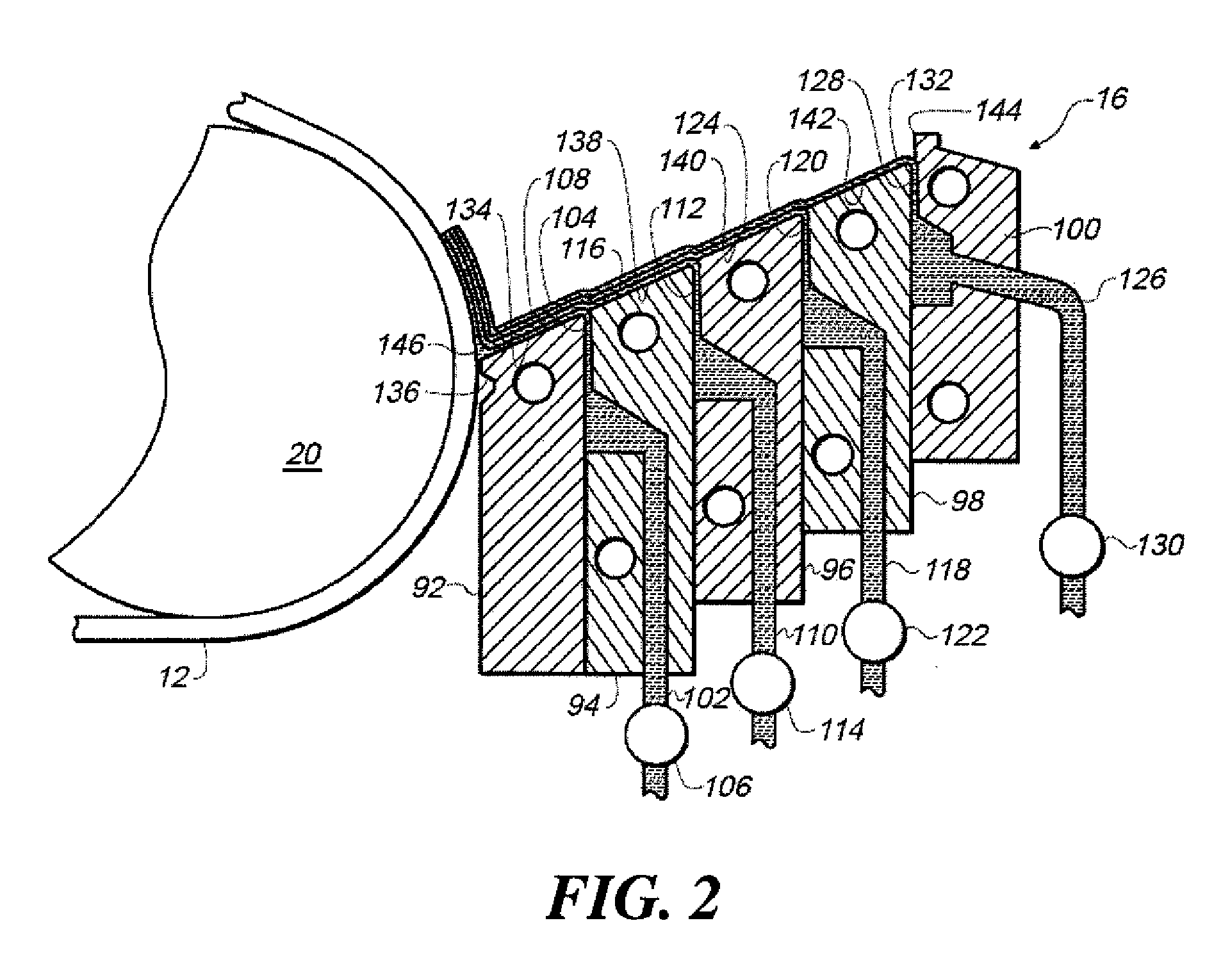 Optical film composite having spatially controlled adhesive strength