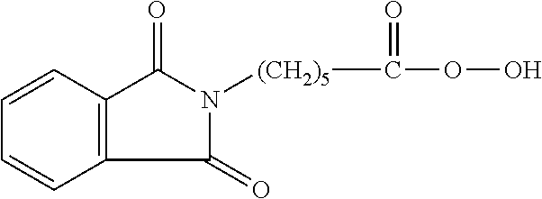 Mildly Alkaline, Low-Built, Solid Fabric Treatment Detergent Composition Comprising Phthalimido Peroxy Caproic Acid