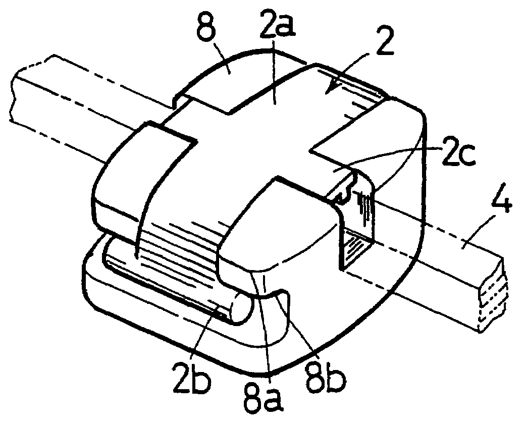 Orthodontic wire ligating member