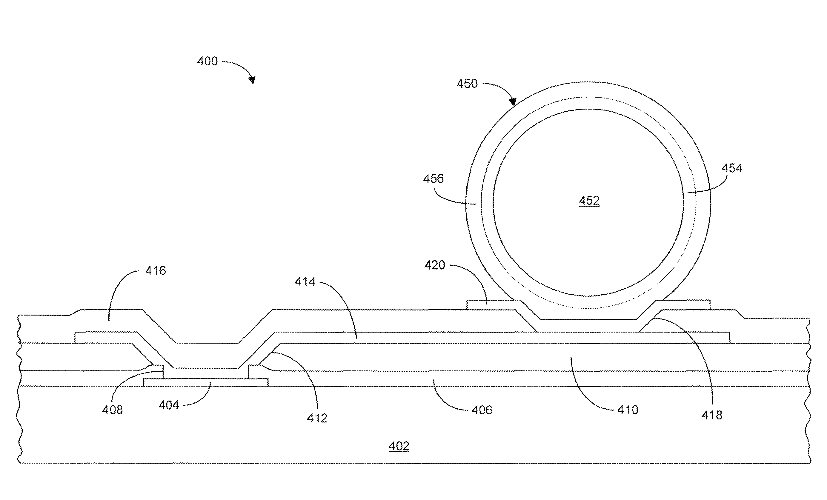 Wafer level package integrated circuit incorporating solder balls containing an organic plastic-core