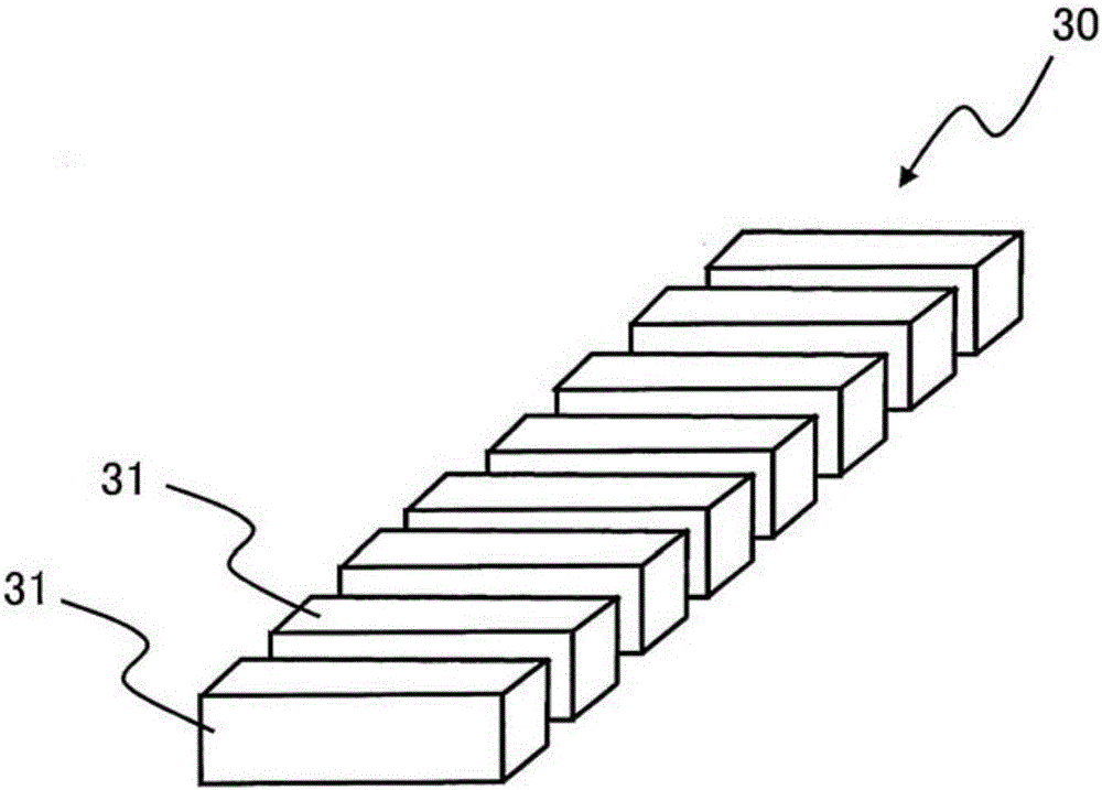 Device and method for inserting magnet into rotor core magnet insertion hole