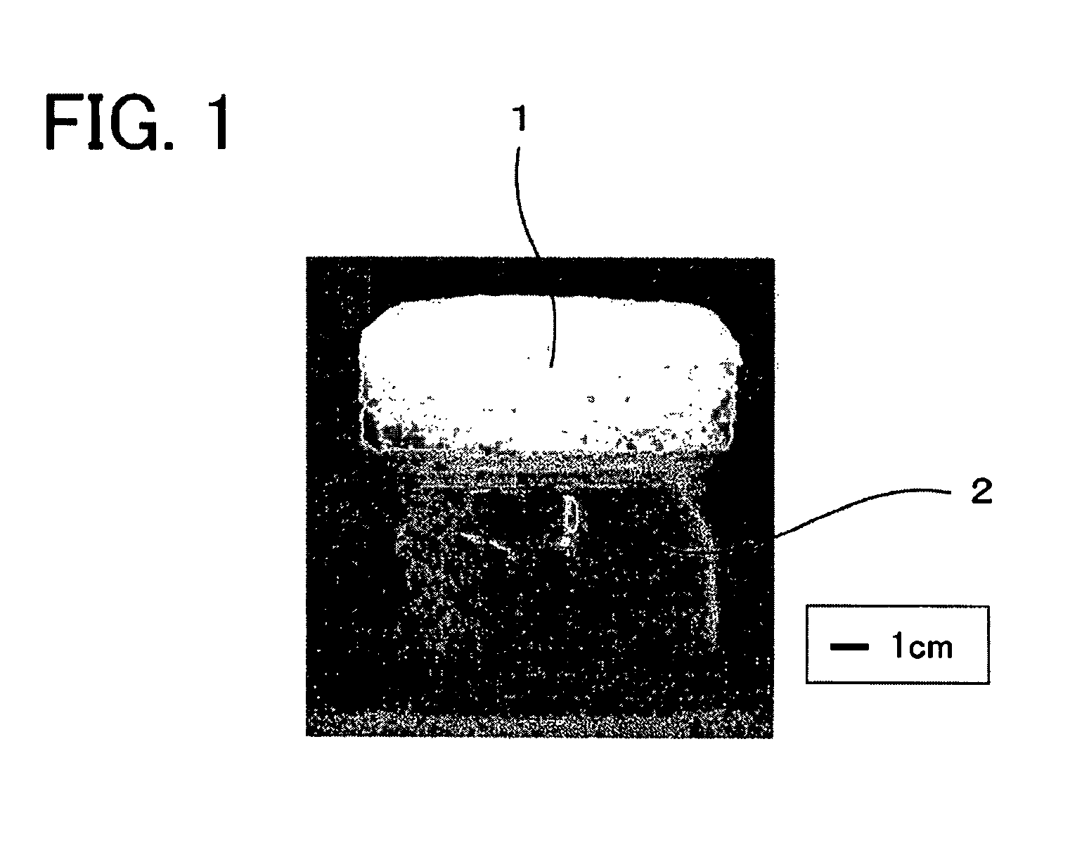 Solid composite material and production method thereof