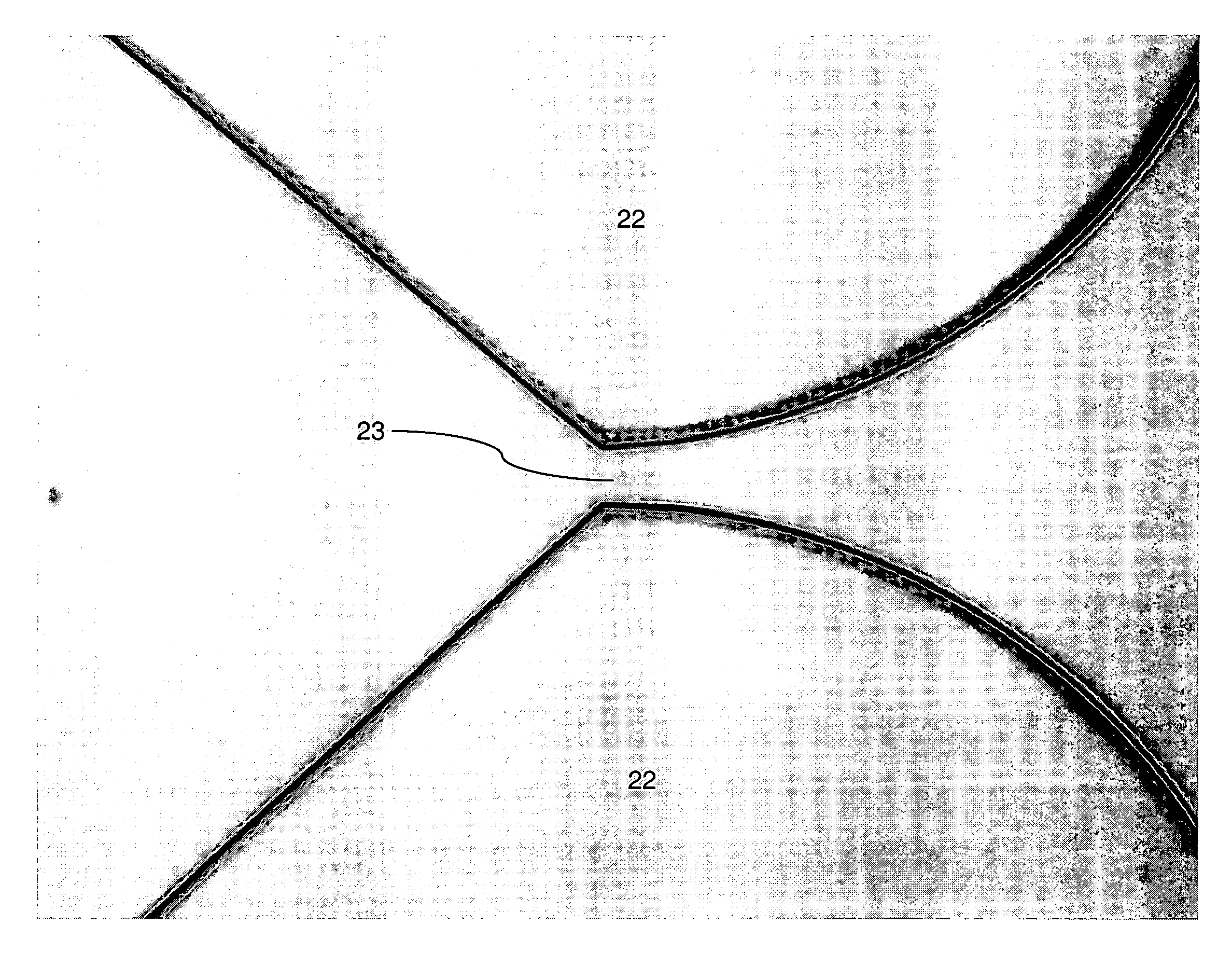 Photolithographic patterning of polymeric materials