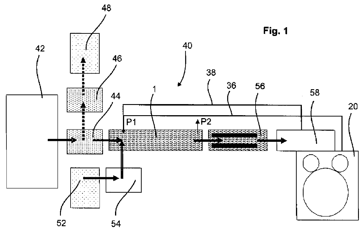 Apparatus and method of producing plastics material containers