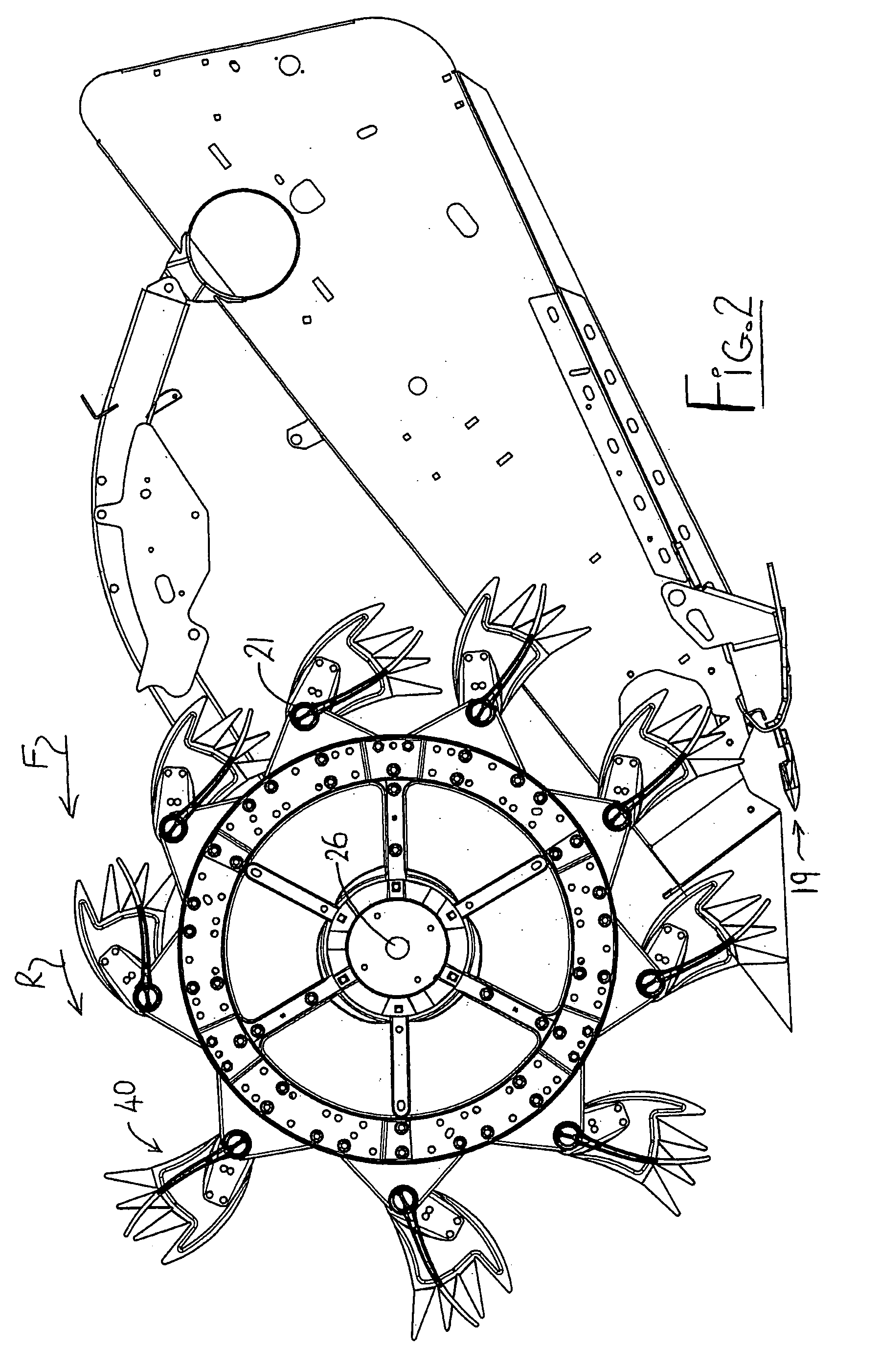 Crop harvesting header with crop divider members carried on the reel