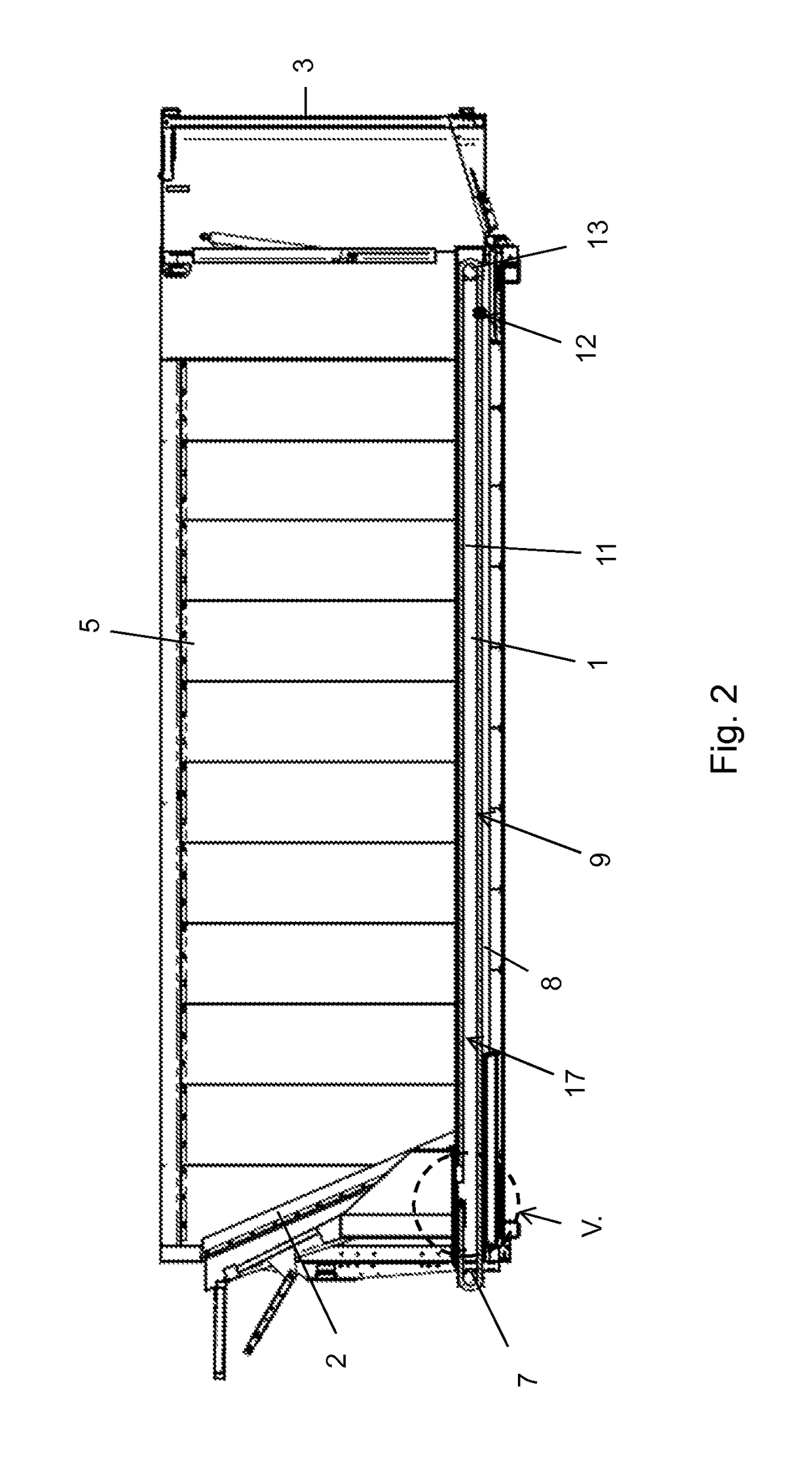 Cargo bay construction with a slideable wall and vehicle with such a cargo bay construction