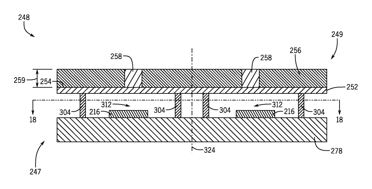 Radio frequency micro-electromechanical systems having inverted microstrip transmission lines and method of making the same