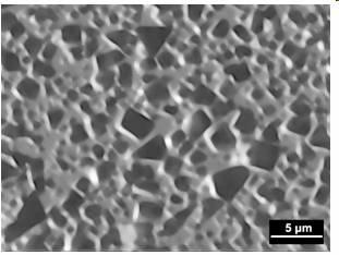 Chemical corrosion method for removing hard phases on surface of hard alloys