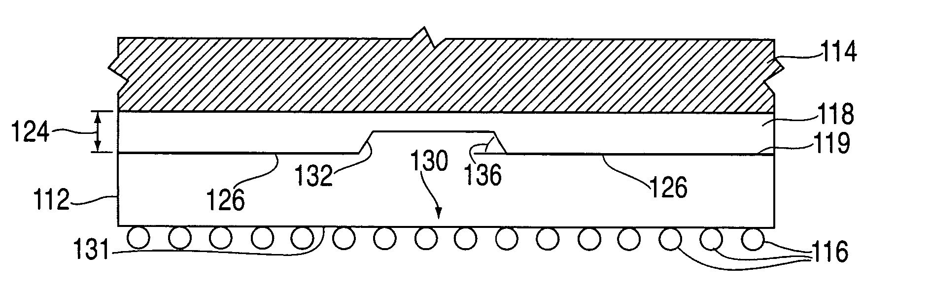 Local reduction of compliant thermally conductive material layer thickness on chips