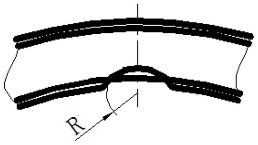 The processing method of the outer ring of the ball head columnar ball filling notch of the double row angular contact ball bearing