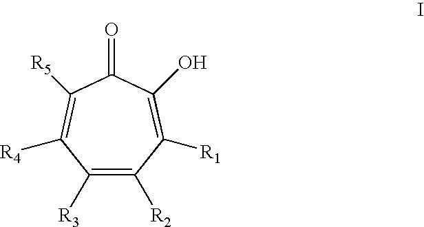 Oral Care Compositions Comprising Tropolone Compounds and Essential Oils and Methods of Using The Same