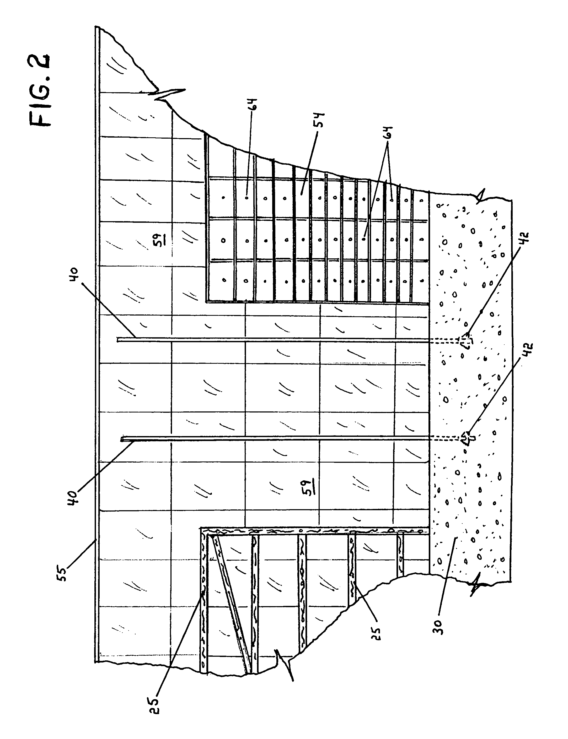 Post-tensioned rammed earth construction