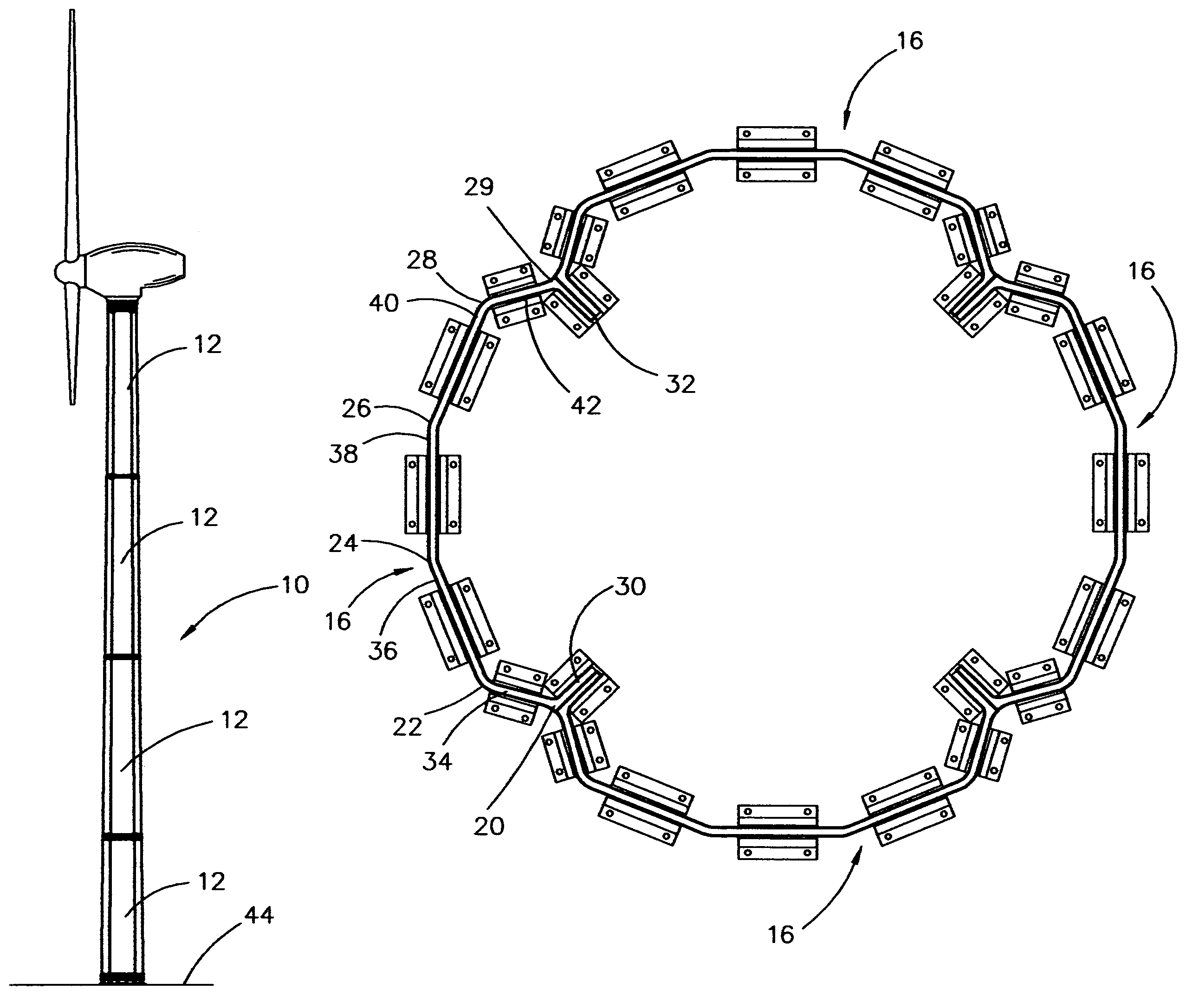 Means for securing the lower end of a wind turbine tower to a foundation