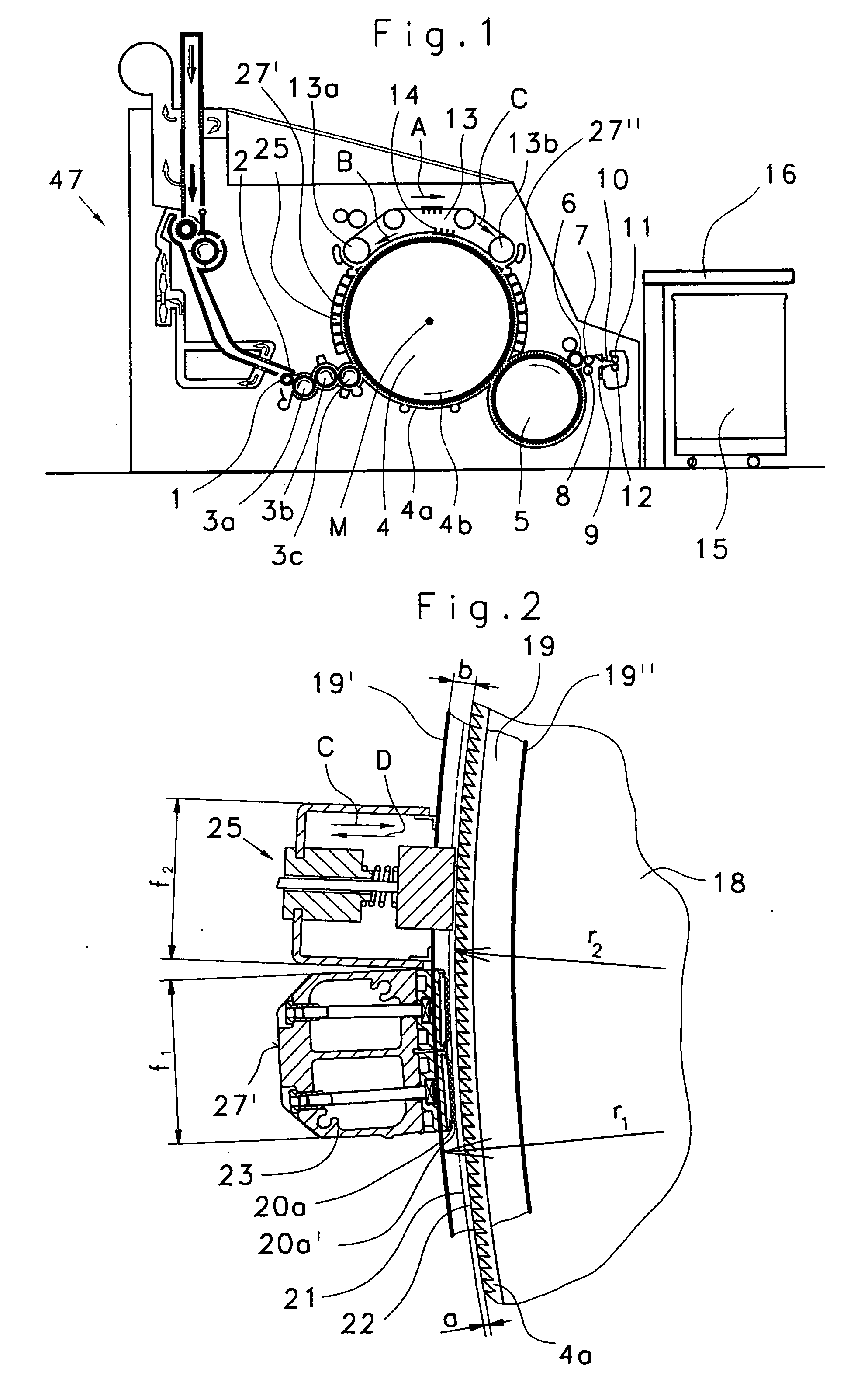 Apparatus at a flat card or roller card for grinding a clothing drawn onto a rotating roller, having a carrying device