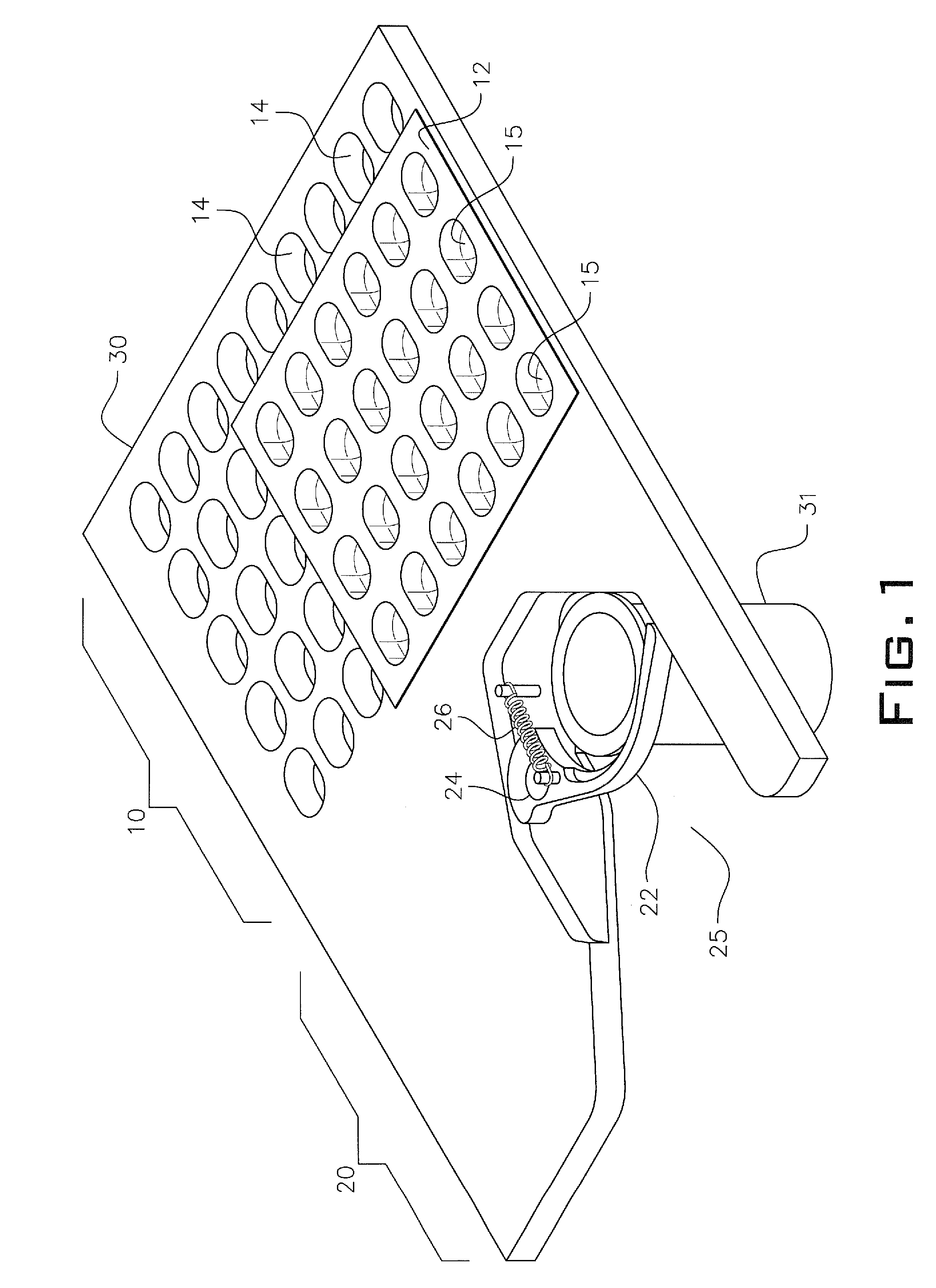 Method of dispensing pills from a movable platen