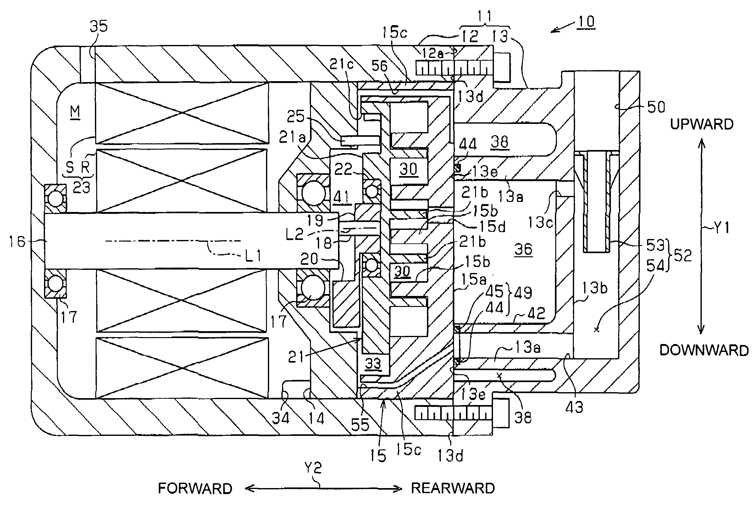 Scroll compressor having an oil reservoir surrounding the discharge chamber and an oil separator in the rear housing