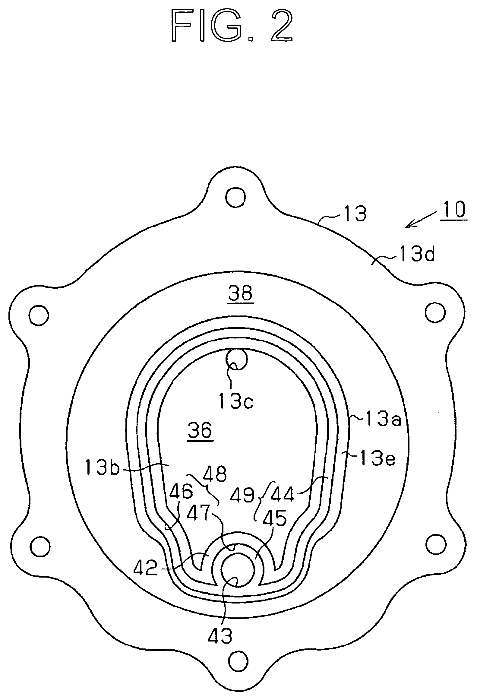 Scroll compressor having an oil reservoir surrounding the discharge chamber and an oil separator in the rear housing